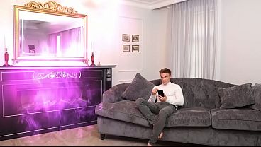 Two Pink Dolls Sitting on a Sofa and One Facial Video
